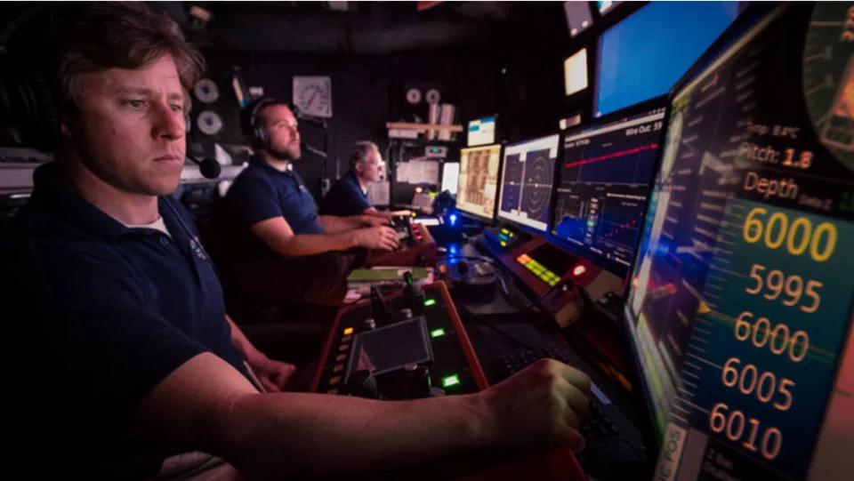 Ocean exploration operators monitoring live vehicle and mission displays