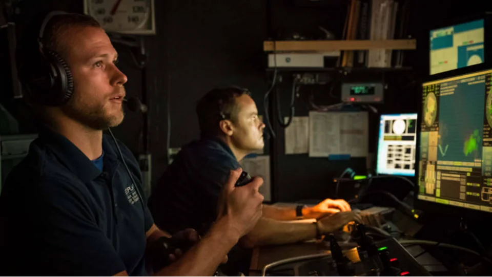 Deep Discoverer pilot operating the robotic manipulator from the control room